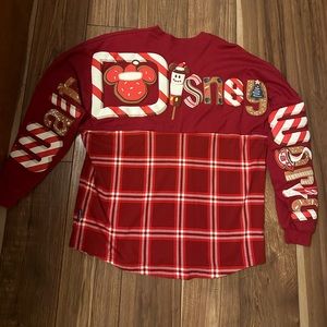 Christmas spirit jersey exclusive from Disney world park. Never has been worn.